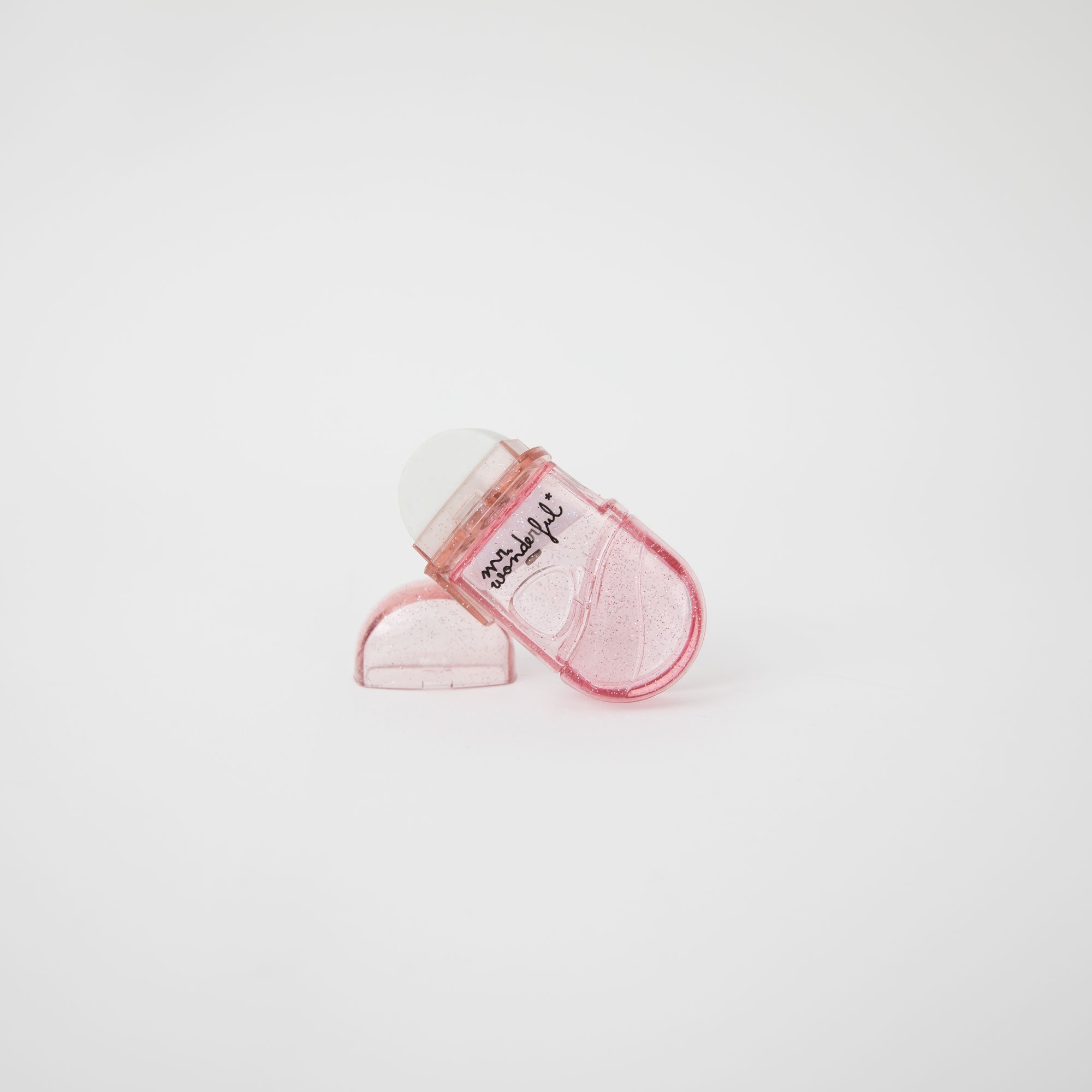 Gomme à paillettes rose avec réservoir