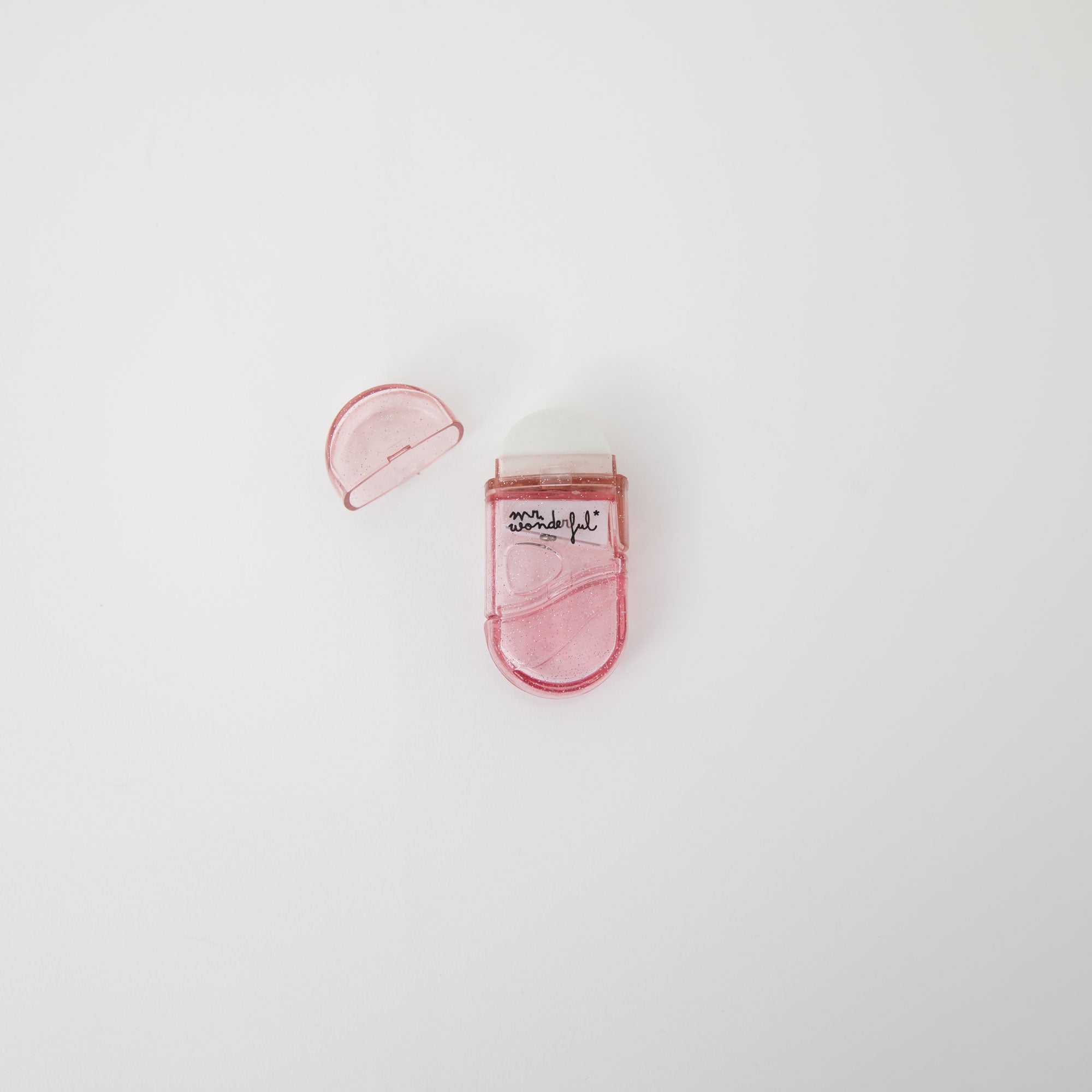 Gomme à paillettes rose avec réservoir