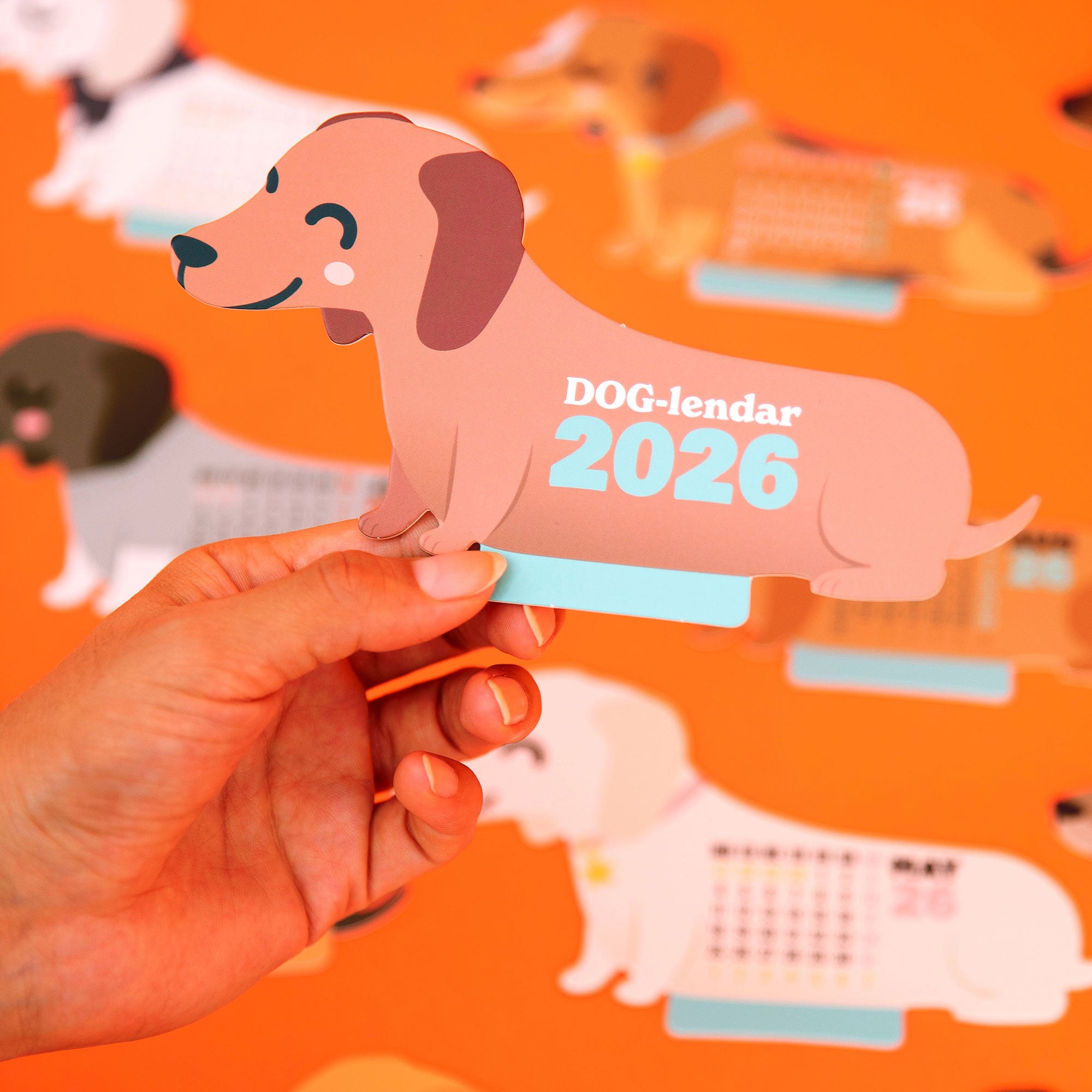 Calendario de sobremesa 2026 con peana - Perro salchicha