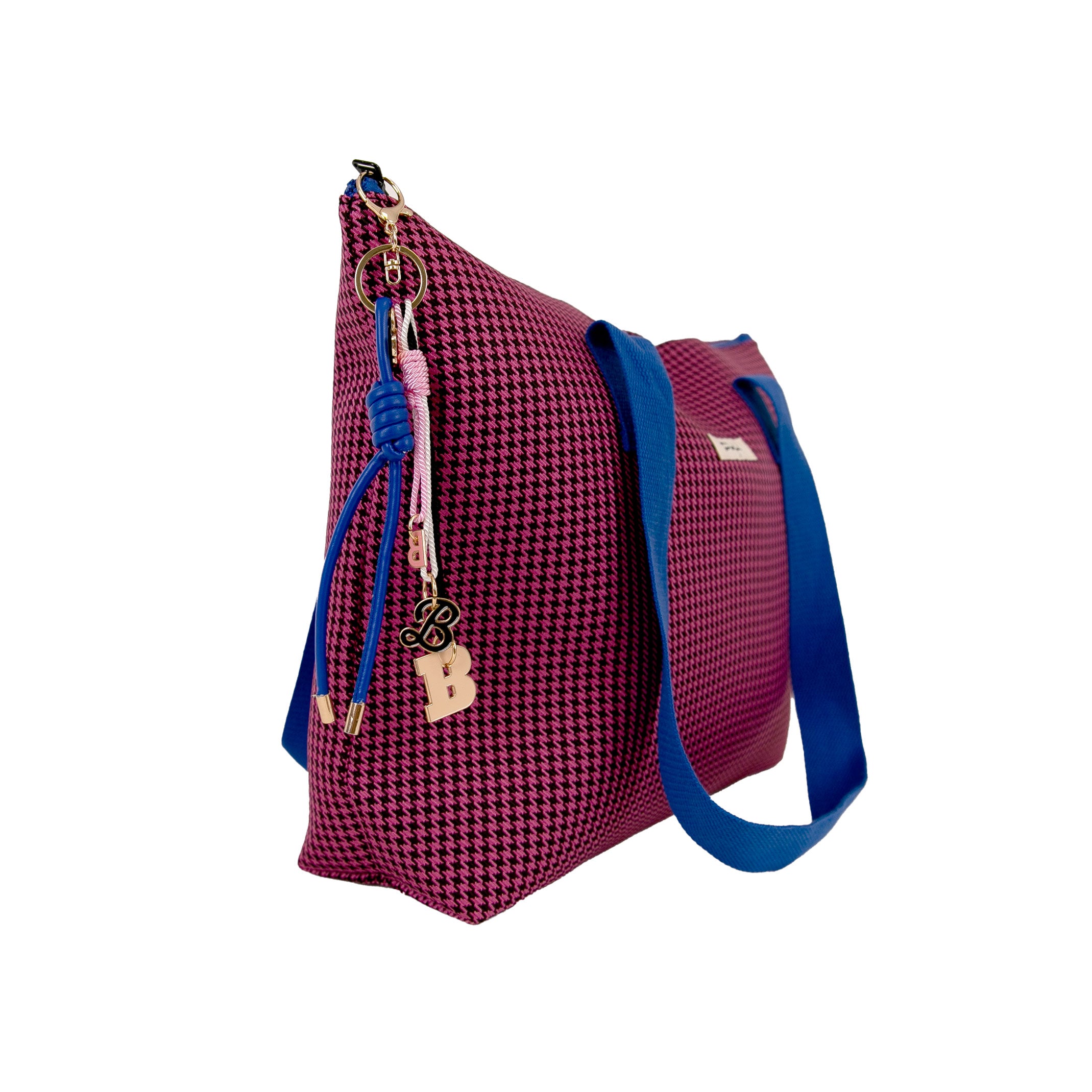Bolso de tela grande con accesorios colgantes